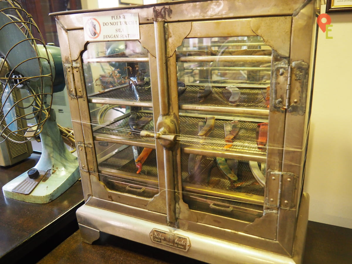 Antique Sanitizing Cabinet For Barber Equipment On Display At Arlene House