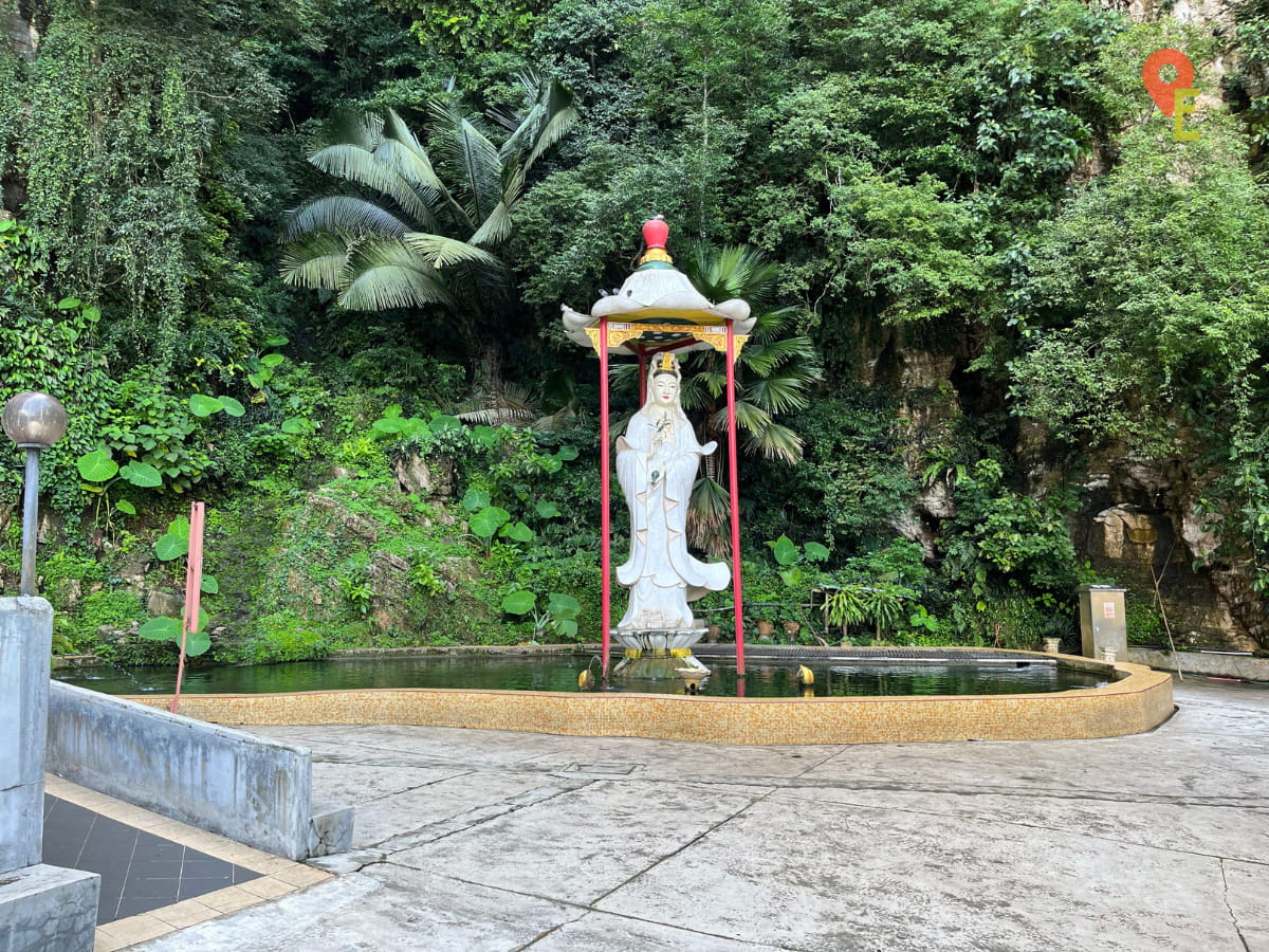 Guan Yin Statue And Koi Pond To The Side Of The Entrance Of Kek Look Tong