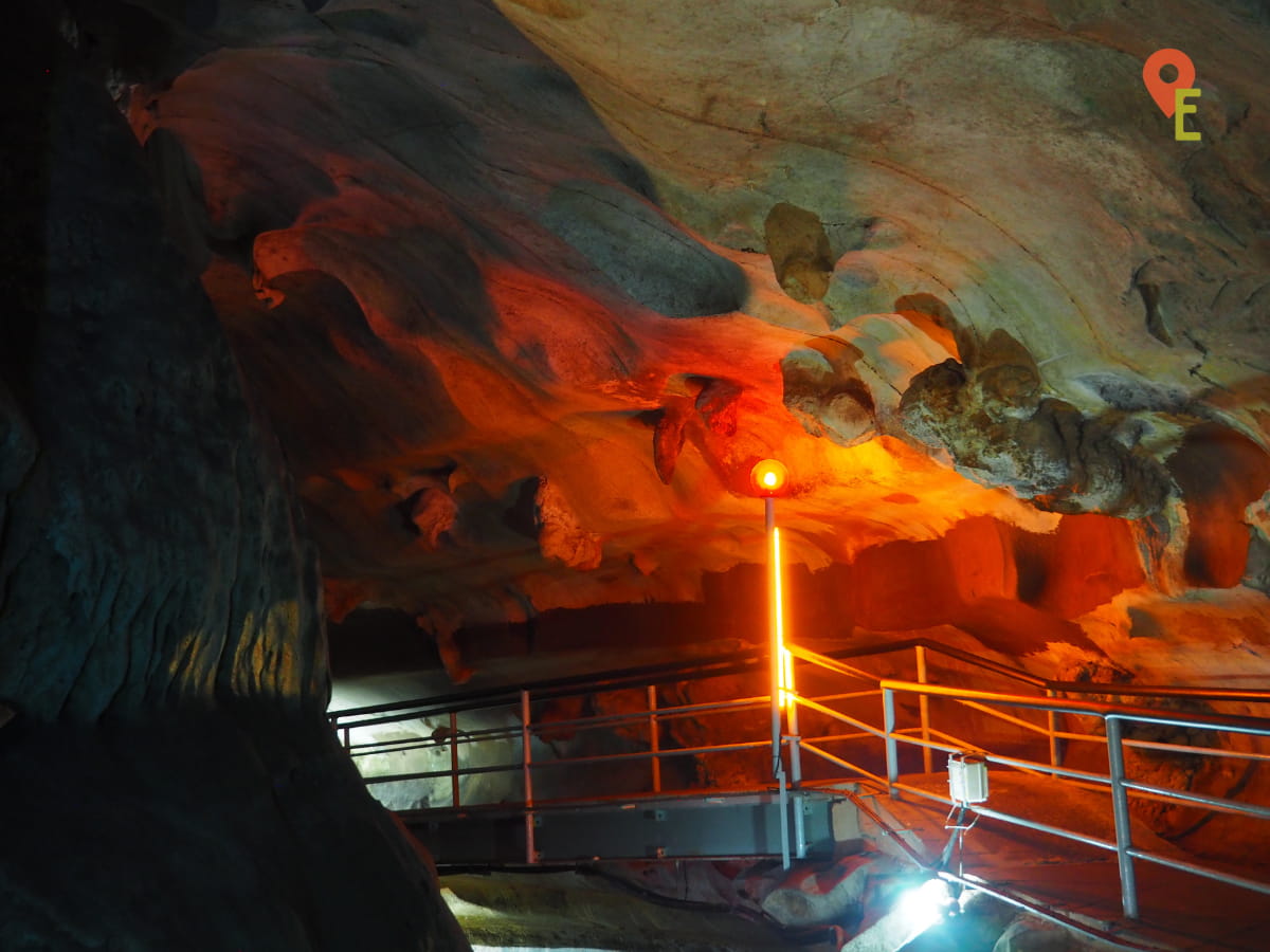 Light Along The Walkway Highlighting Features On The Cave Walls Of Gua Tempurung