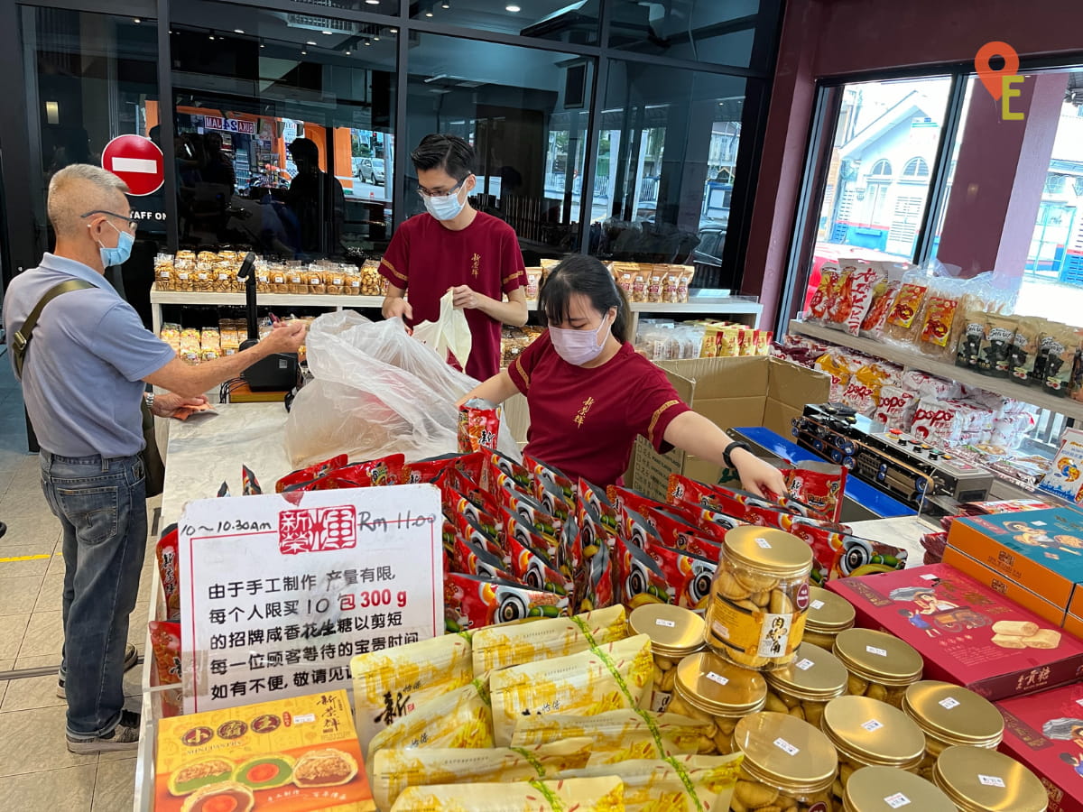 Staff Packing Peanut Candy At Sin Weng Fai Peanut Candy Shop